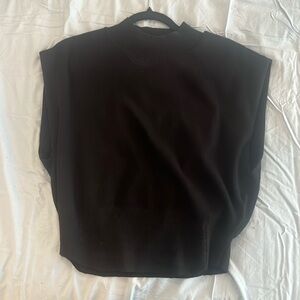 Black knit top with structured shoulders